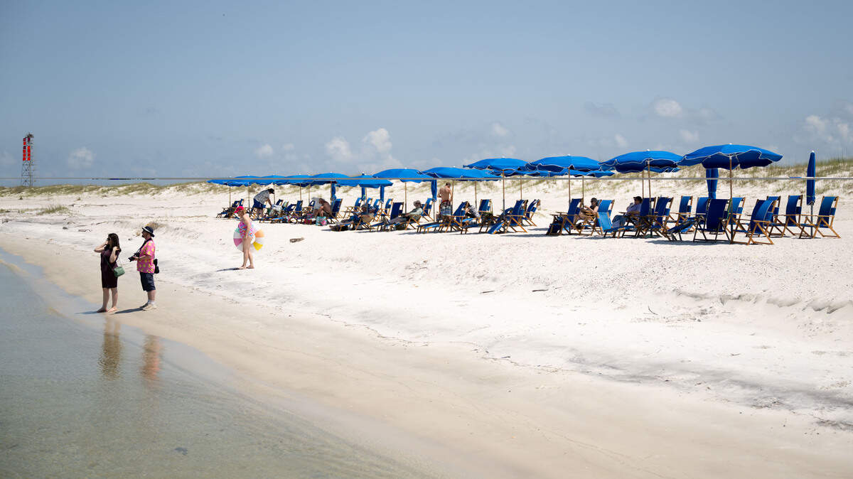 Visitors enjoy the beach on the north side of Ship Island during a recent day trip on a Gulfport-based Ship Islands Excursion ferry on Wednesday, April 29, 2026.