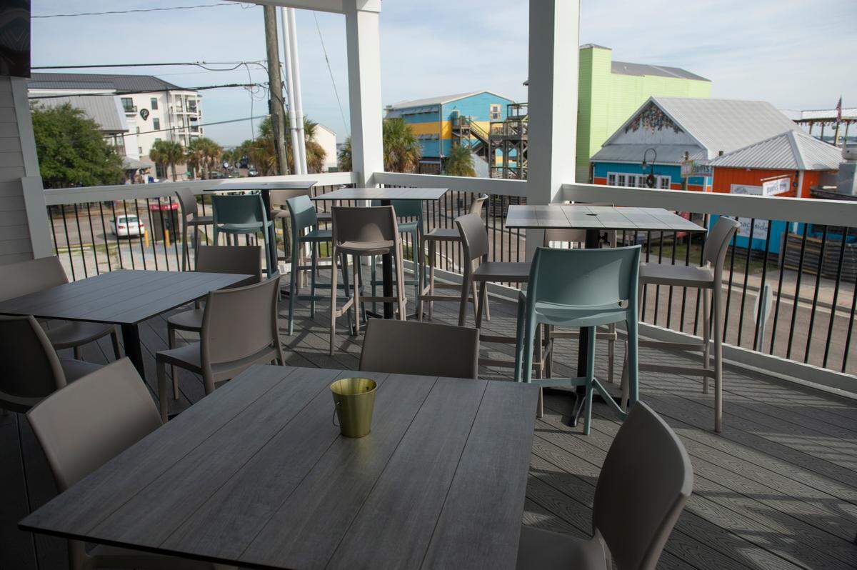 The second floor of Rags to Riches in Bay St. Louis on Thursday, Dec. 7, 2023. The two-story bar features a sports bar atmosphere on the first floor and a wine bar on the second floor.