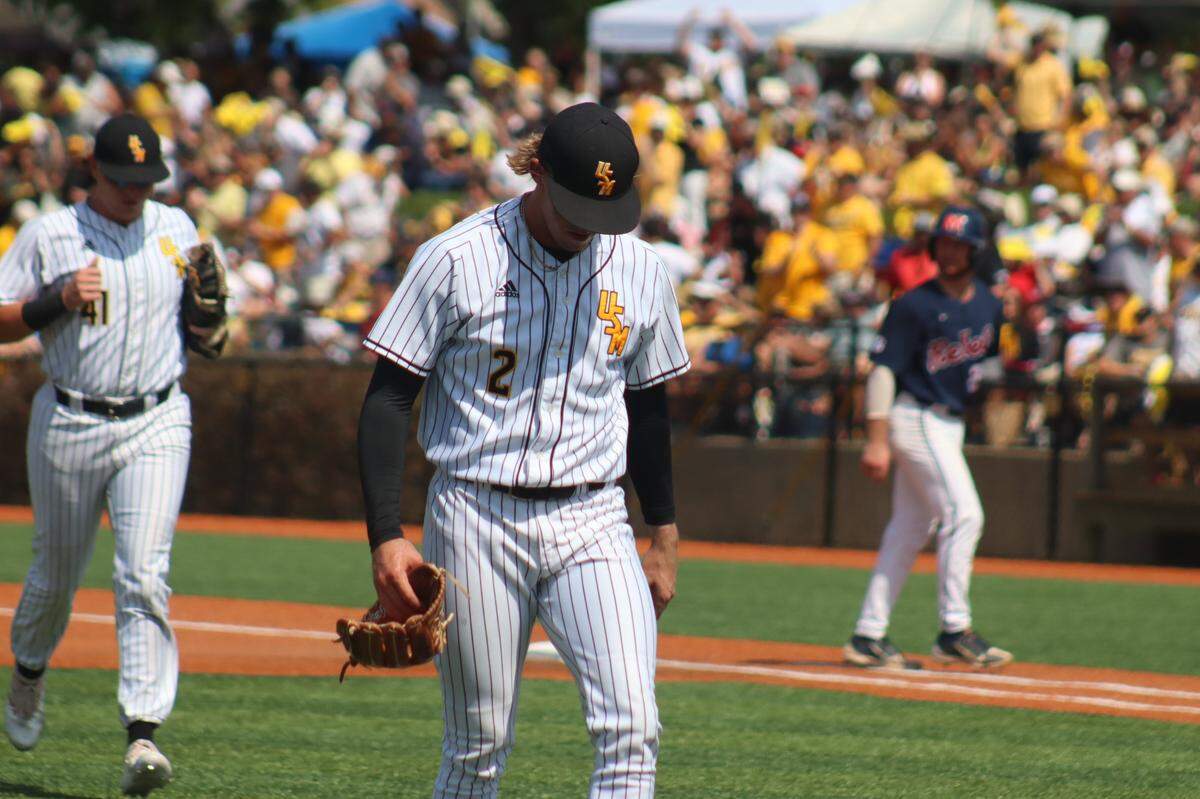 Southern Miss pitcher Huston Waldrep walks off the mound after pitching through five innings against Ole Miss.
