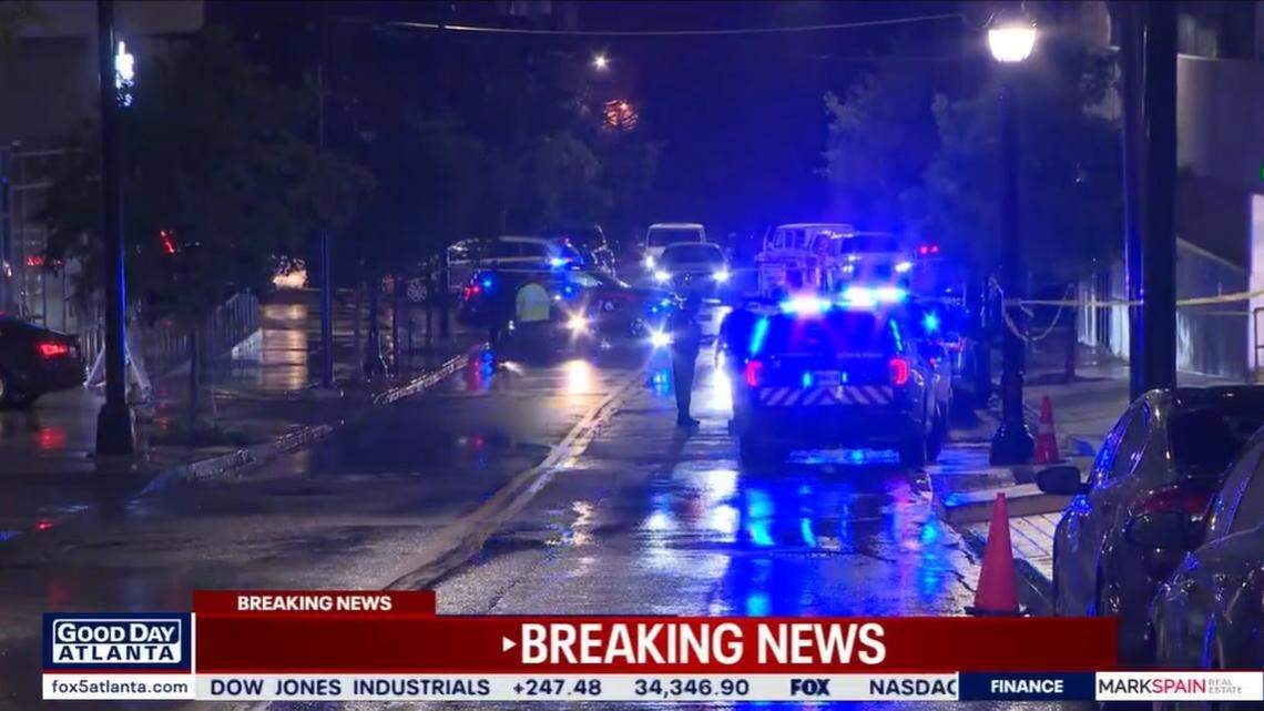 A security guard was fatally shot at a Midtown Atlanta parking garage while trying to stop men caught breaking into cars, police said.