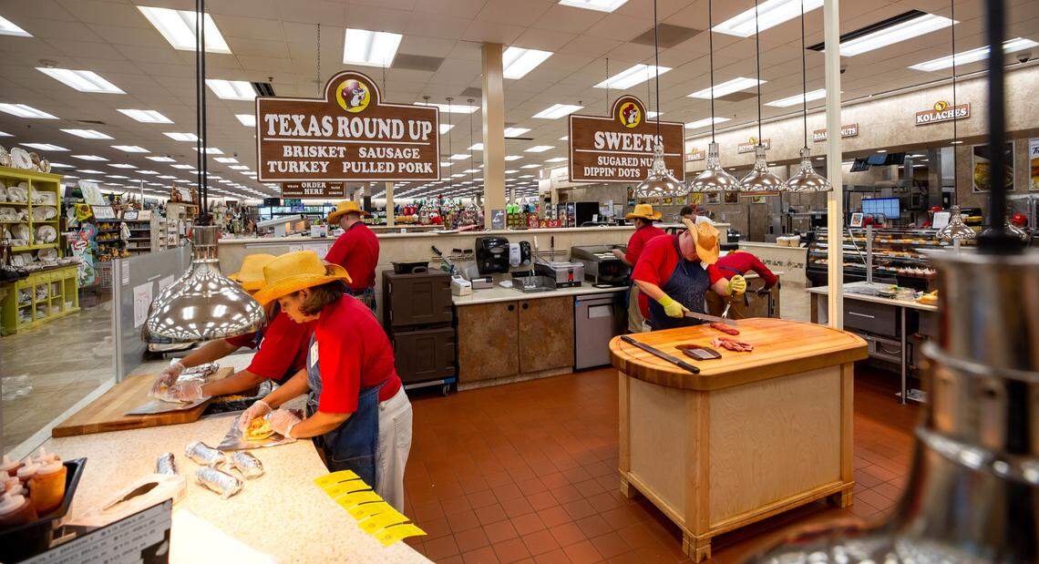 Buc-ee’s staff members work to prepare brisket and other specialties of the travel centers. The new Buc-ee’s in South Mississippi will create more than 200 full-time jobs.