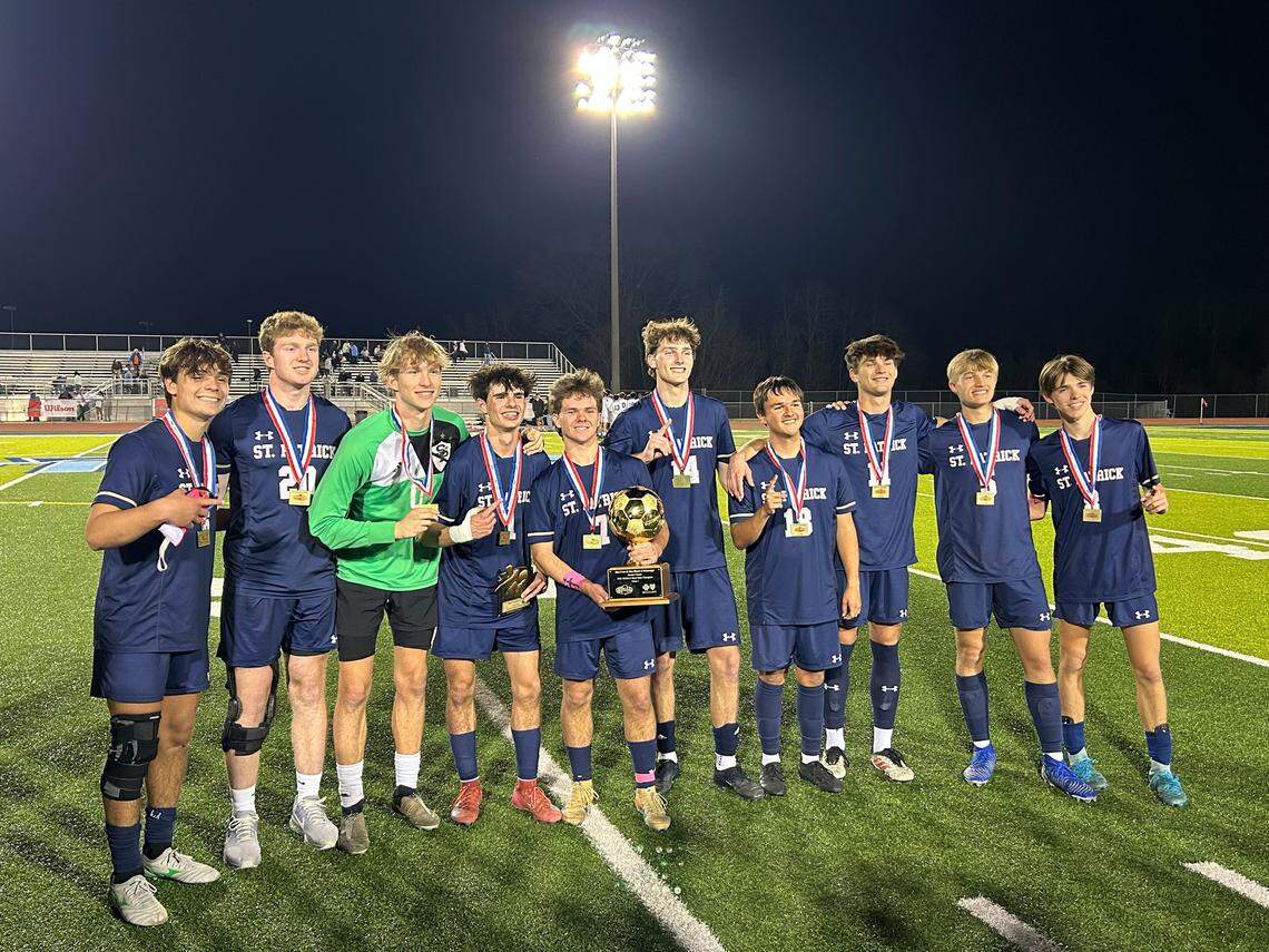 St. Patrick’s seniors with the gold ball after winning the Class I state title on Feb. 20, 2026.