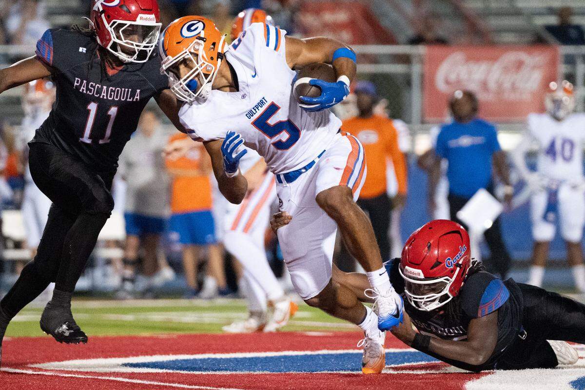 Gulfport running back Cooper Crosby (5) picks up yards Friday in the Admirals’ win over Pascagoula.