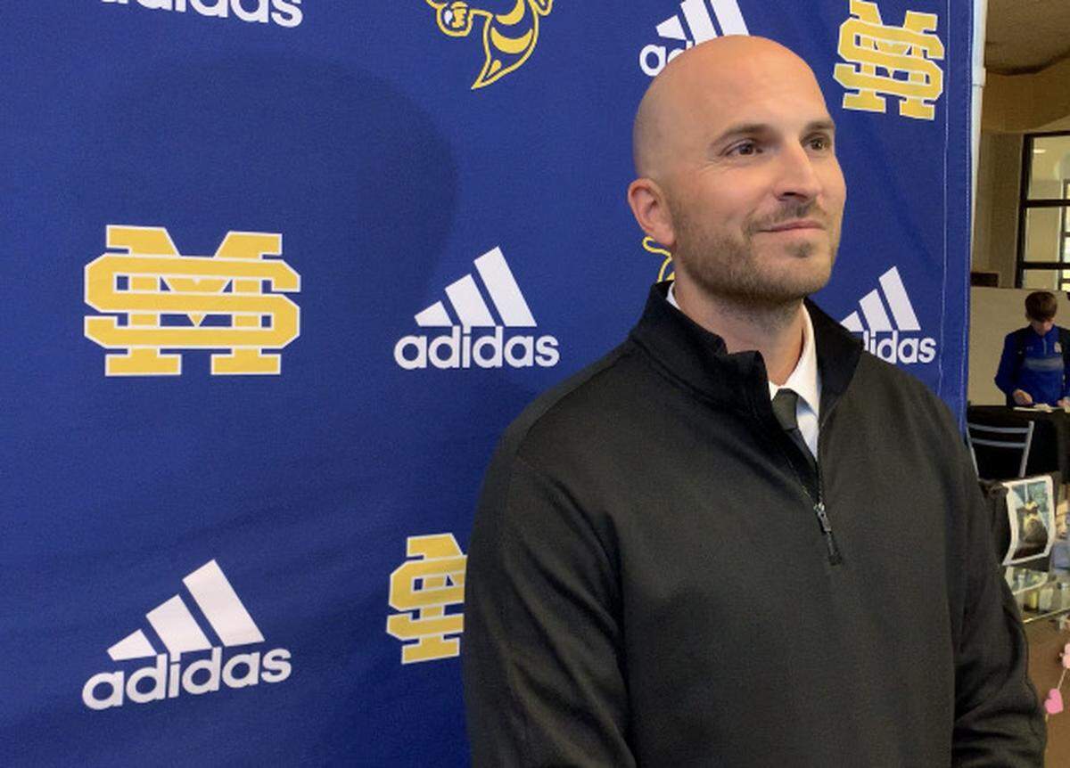New St. Martin head football coach Ty Smith fields questions from the media at his introductory press conference