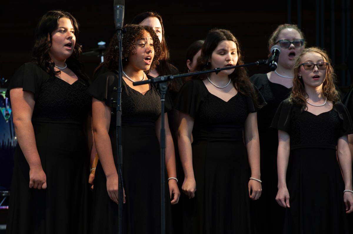 The Gautier High School choir performs during a ribbon cutting ceremony at The Sound Amphitheater in Gautier prior to KC and The Sunshine Band’s performance on Friday, April 12, 2024.