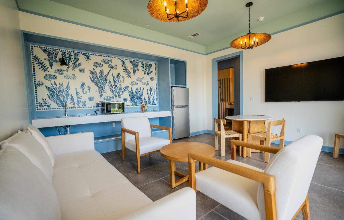 The new Pass Bungalows has one-bedroom penthouse hotel rooms with great water views and two-bedroom family suites with a living room, full size refrigerator and microwave.