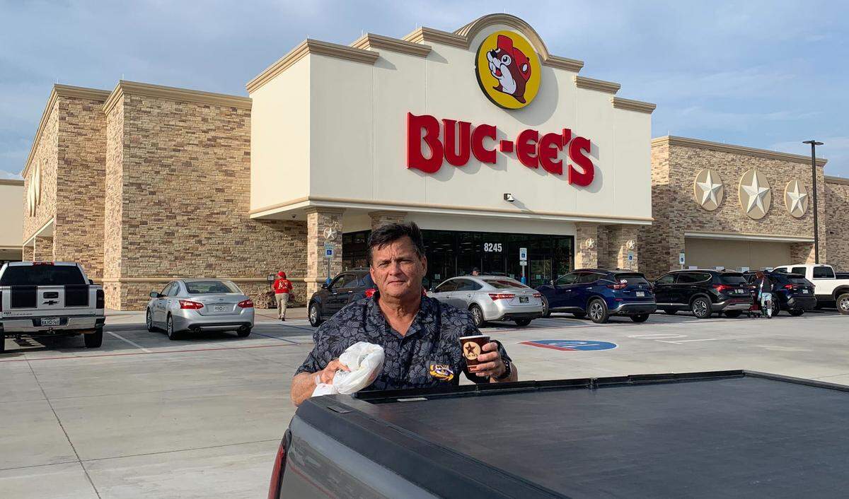 There’s no spot to eat inside, so Randy Doubleday of Mandeville, Louisiana, had breakfast outside in the parking lot.