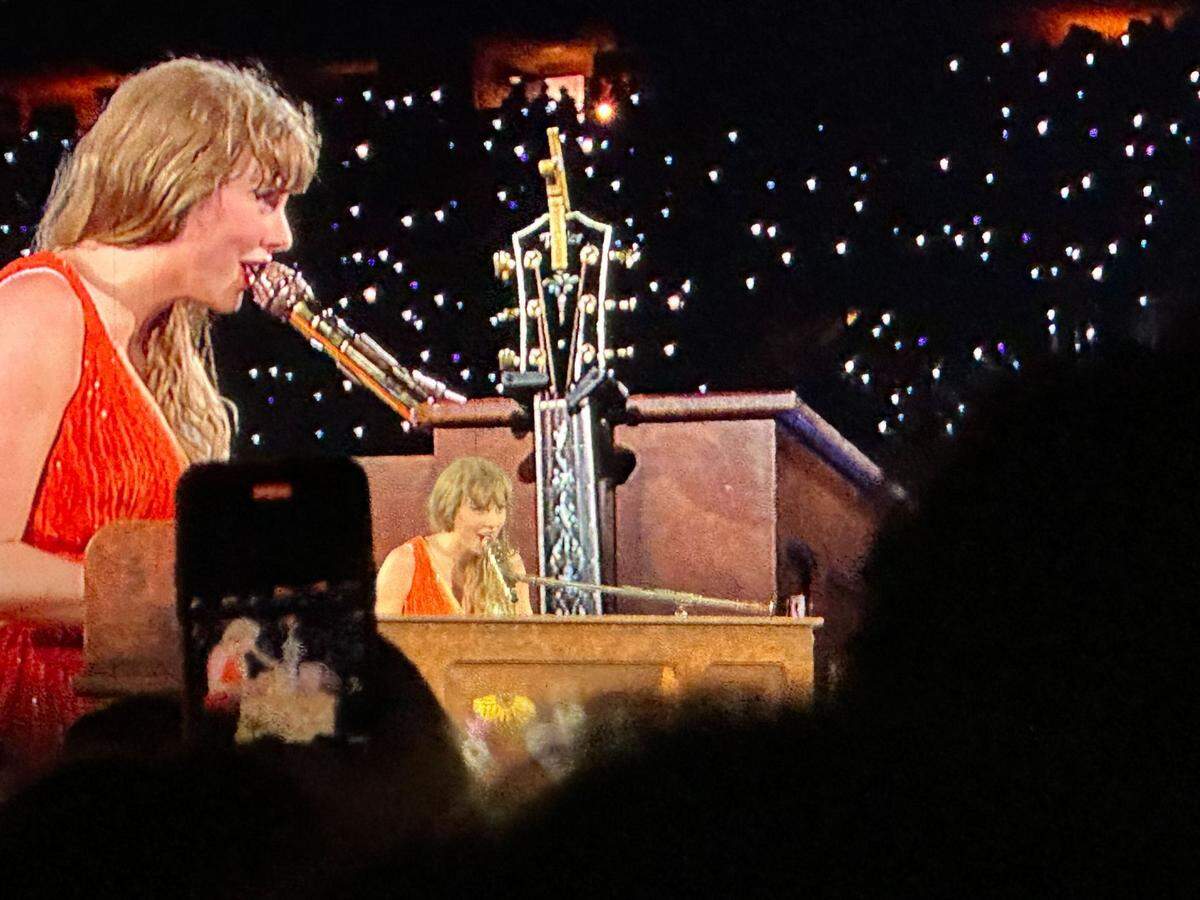 Taylor Swift performs a combination of The Black Dog and Haunted on piano Friday, Oct. 25, 2024, as special songs during her set at the Superdome in New Orleans.