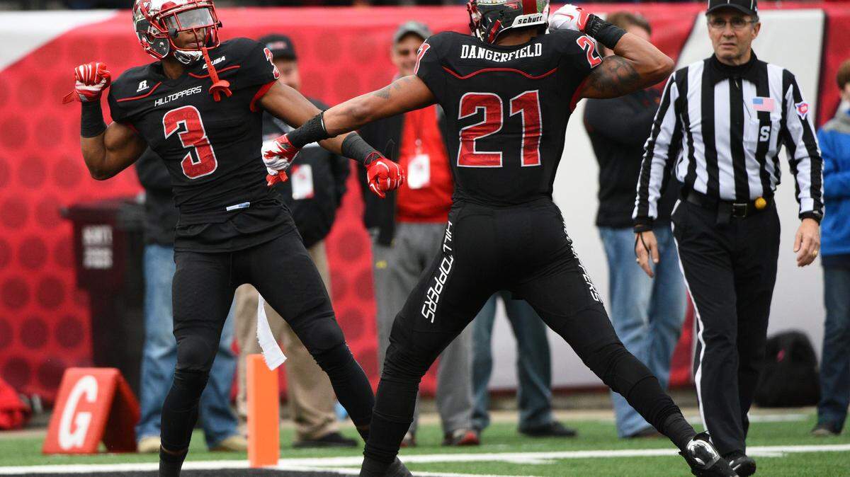 MICHAEL NOBLE JR./ASSOCIATED PRESS 
 Western Kentucky wide receiver Antwane Grant (3) celebrates his touchdown with wide receiver Jared Dangerfield (21) on Friday at L.T. Smith Stadium in Bowling Green, Ky.