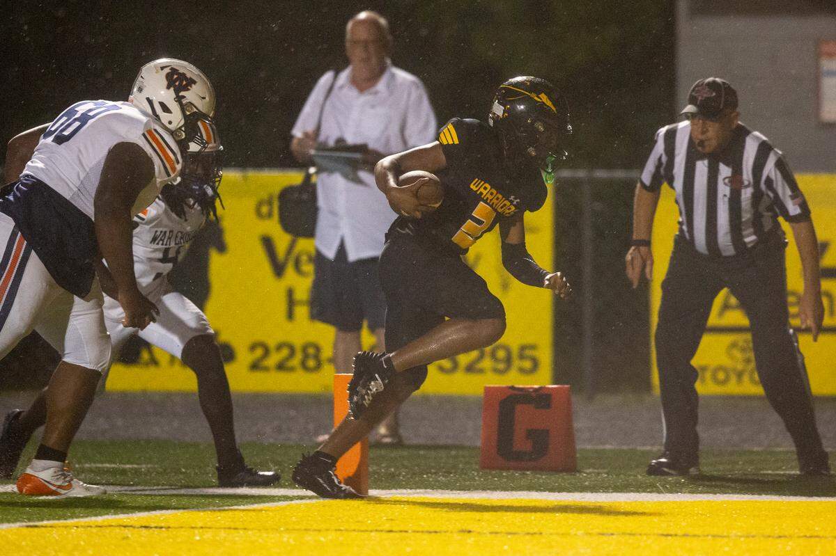 D’Iberville’s Jordan Walley runs the ball out at the one yard line during a game between D’Iberville and Wayne County at Warrior Stadium in D’Iberville on Friday, Oct. 4, 2024.