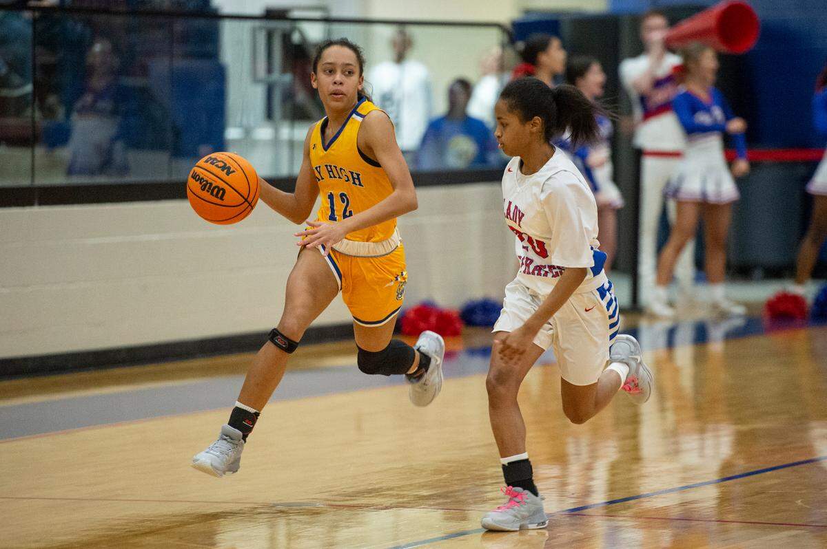 Bay High’s Kiara Burney dribbles the ball down the court during a game against Pass Christian in Pass Christian on Tuesday, Jan. 23, 2024.