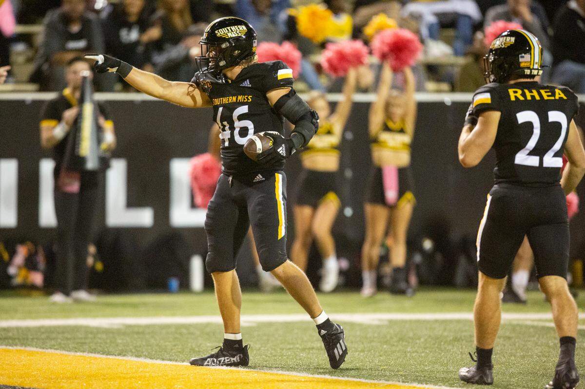 Southern Mississippi linebacker Averie Habas (46) celebrates after a play during the second half of an NCAA college football game in Hattiesburg, Miss., Thursday, Oct. 27, 2022. (Hannah Ruhoff/The Sun Herald via AP)