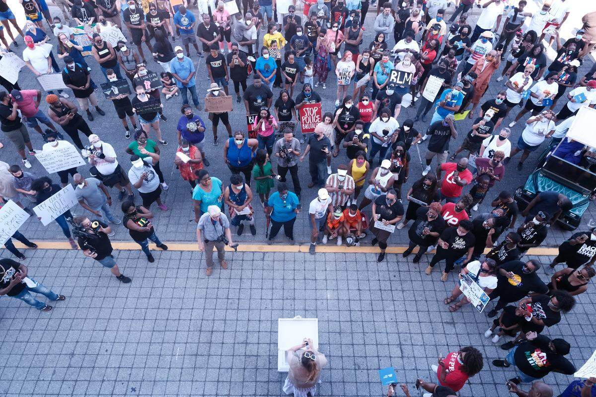 Hundreds gather in front of Biloxi’s City Hall in 2020 after marching through downtown to listen to speakers and praise and worship. The Unity March was the first Juneteenth event of the day.
