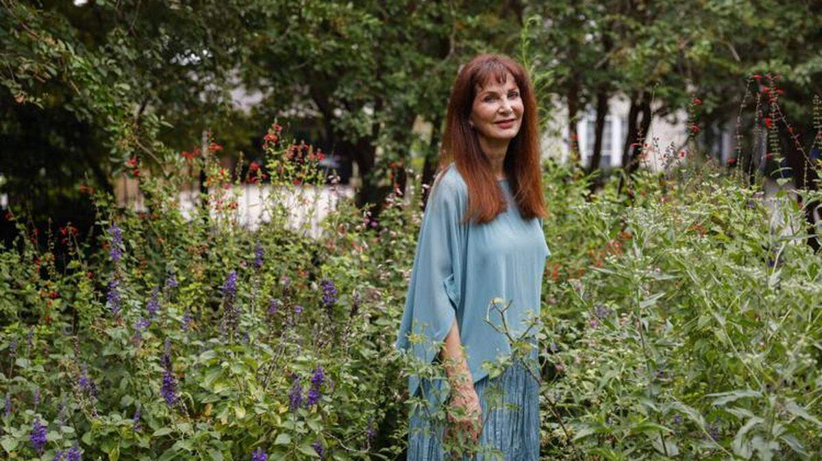 WDSU chief meteorologist Margaret Orr poses with wildflowers in her hometown of New Orleans last year.