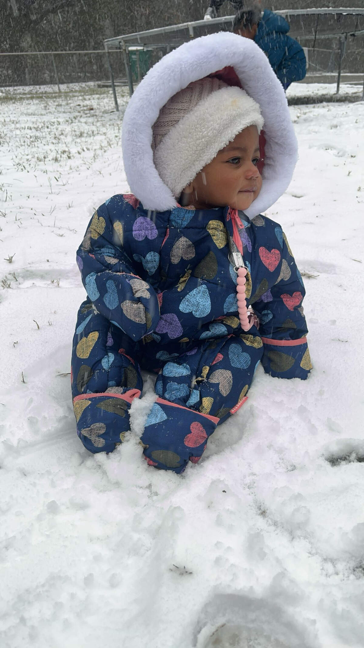 Andrea S Coker sent in a photo of 8-month-old McKenna Jo Walker experiencing her first snow in Gulfport.