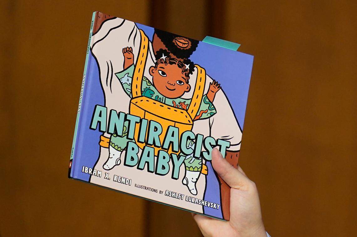 Sen. Ted Cruz, R-Texas, holds up a book as he questions Supreme Court nominee Judge Ketanji Brown Jackson during her confirmation hearing before the Senate Judiciary Committee Tuesday, March 22, 2022, on Capitol Hill in Washington. (AP Photo/Carolyn Kaster)