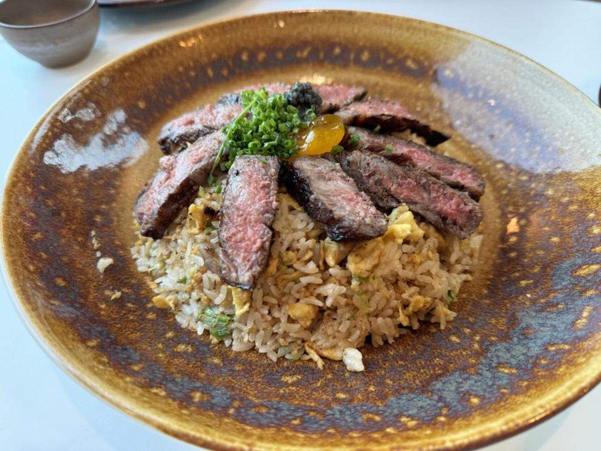 The wagyu fried rice with a cured egg yolk and caviar at Toro Sushi & Sake in downtown Bay St. Louis.