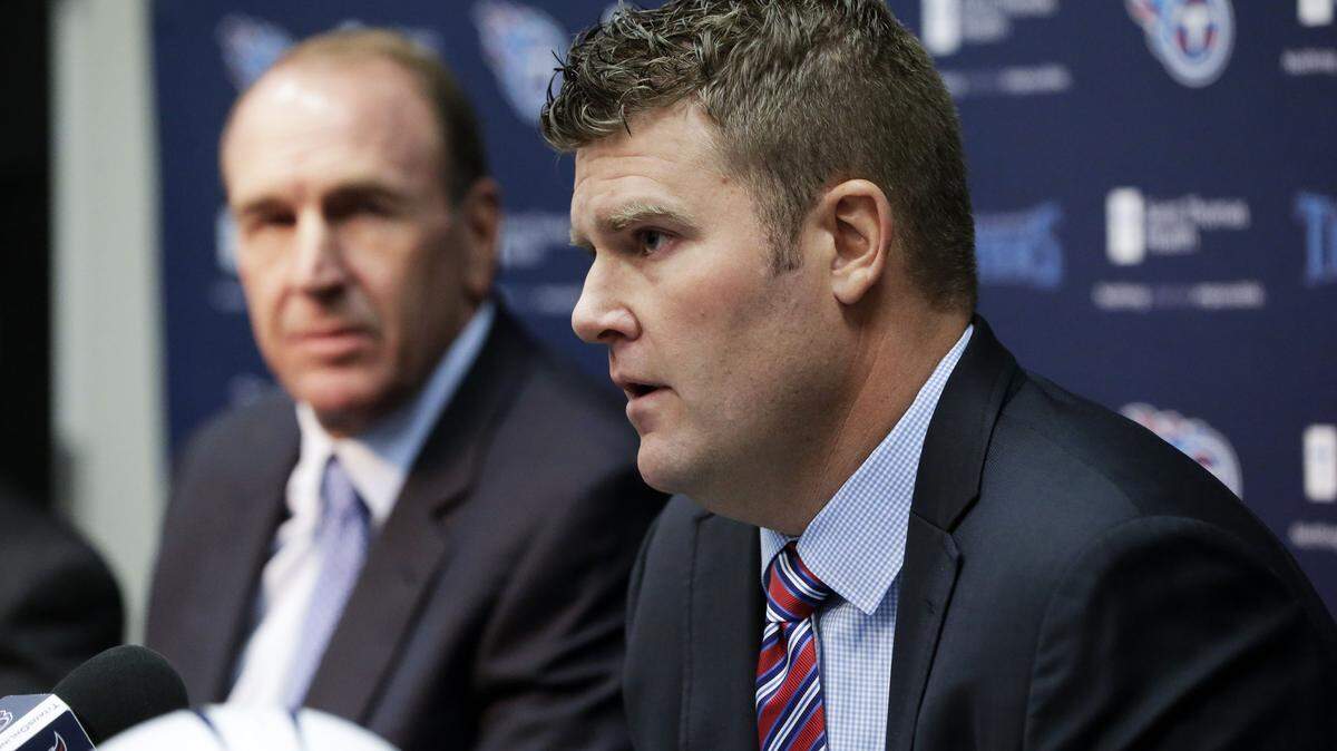MARK HUMPHREY/ASSOCIATED PRESS 
 Tennessee Titans general manager Jon Robinson, right, and head coach Mike Mularkey answer questions at a news conference in Nashville, Tenn. Jon Robinson has been very busy since being hired as Tennessee's new general manager. He's had to study the Titans' current players, prep for the start of free agency and the NFL Combine holding the No. 1 pick overall in the April draft.
