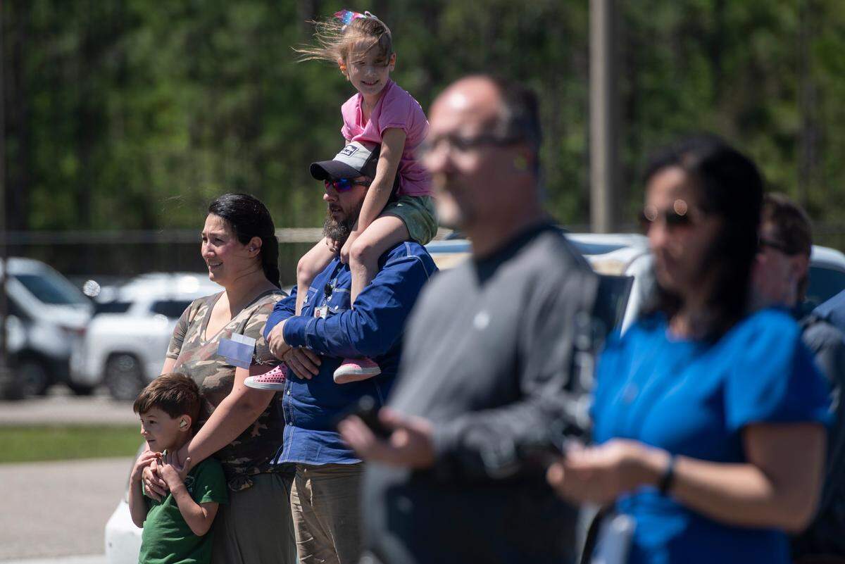 NASA guests and employees watch as NASA tests an RS-25 engine at NASA’s Stennis Space Center in Bay St. Louis on Wednesday, April 3, 2024. The engines, which are destined for NASA’s Artemis missions back to the moon, are assembled and tested at Stennis.
