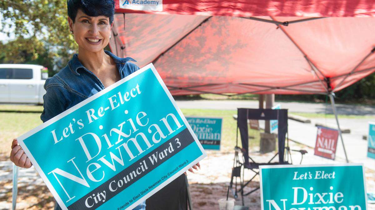 Dixie Newman, who is running for re-election for Biloxi city council, poses outside a polling location at West Biloxi Library during a primary runoff election on Tuesday, April 22, 2025.
