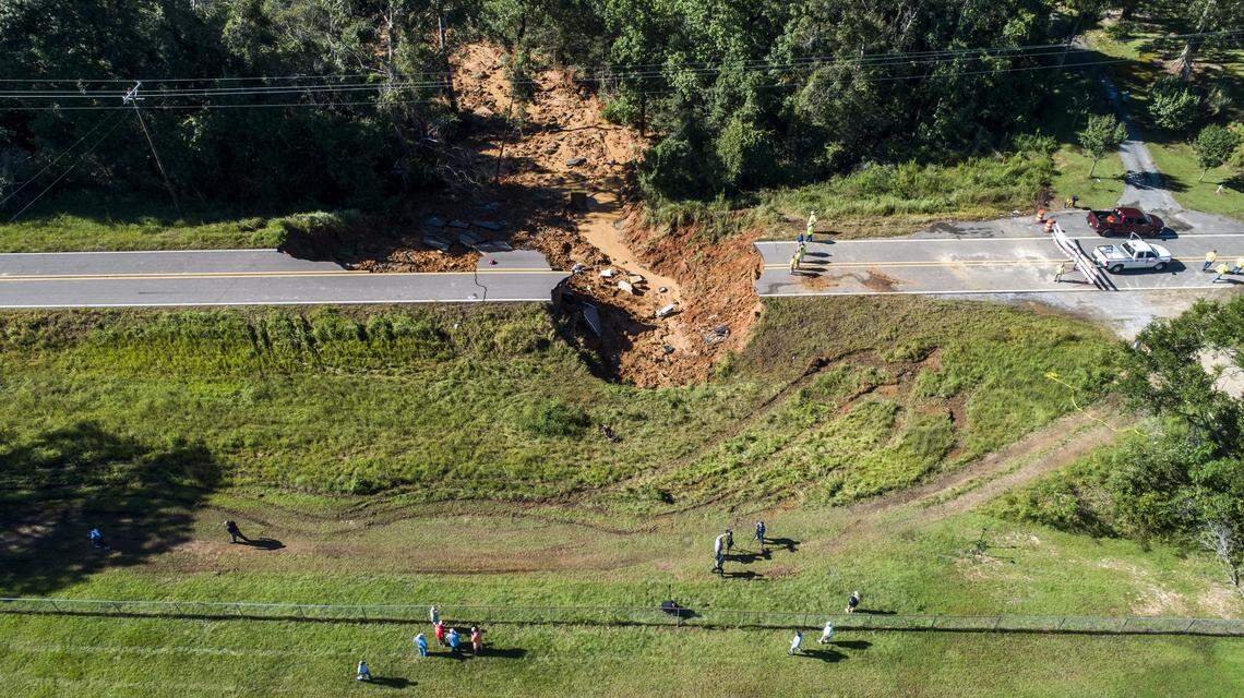 A drone photograph shows the scene where a section Highway 26 collapsed late Monday night, due to heavy rains from Hurricane Ida in the Benndale community in George County, MS Tuesday, Aug. 31, 2021. Two people ere dead and 10 others were injured, three of them critically, the Mississippi Highway Patrol said Tuesday morning.