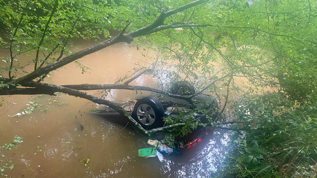 Louisiana state wildlife officer Clint Branton and Senior Agent Hunter Breed watched as a Honda Civic crossed over the road and ran into a creek. They quickly sprang into action.