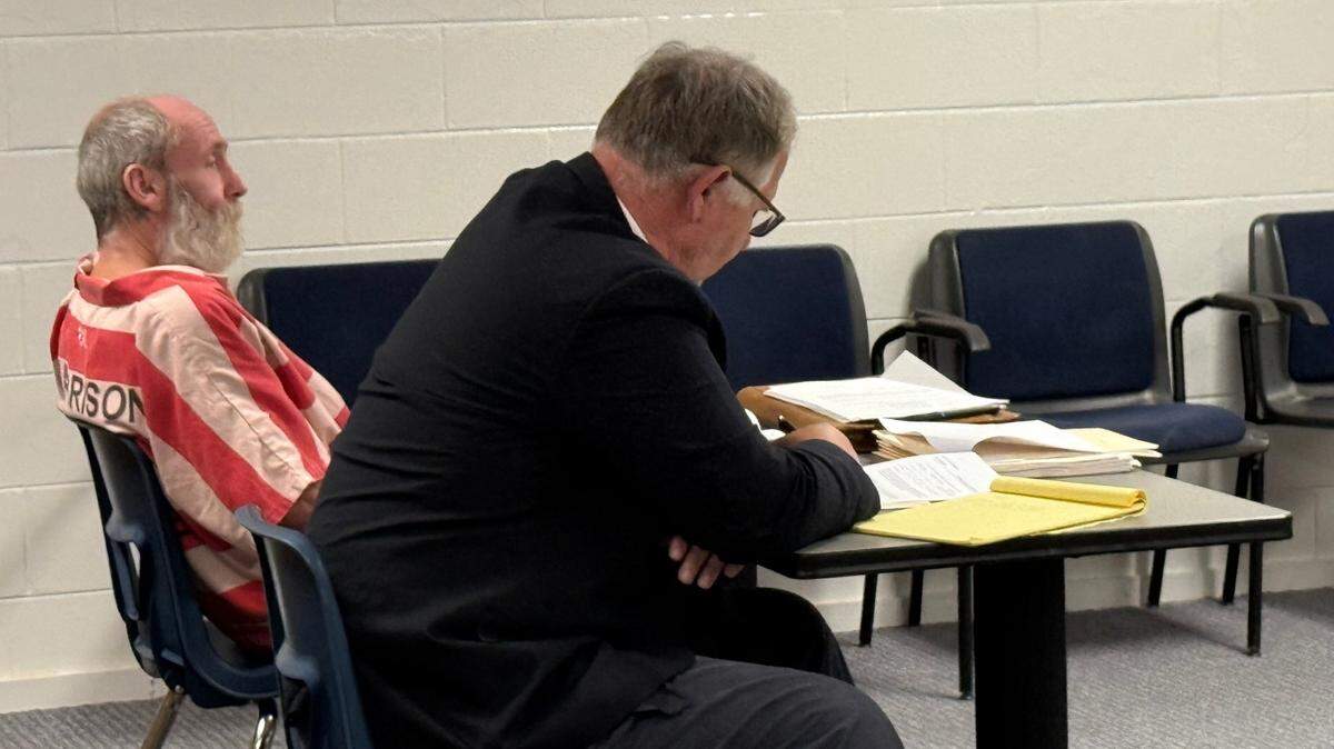 Floyd Charles Guy is charged with attempted murder in the April 8 stabbing of his roommate. Guy, left, sat next to his attorney, Phil Wittman, during his preliminary hearing iin the courtroom at the Harrison County jail.