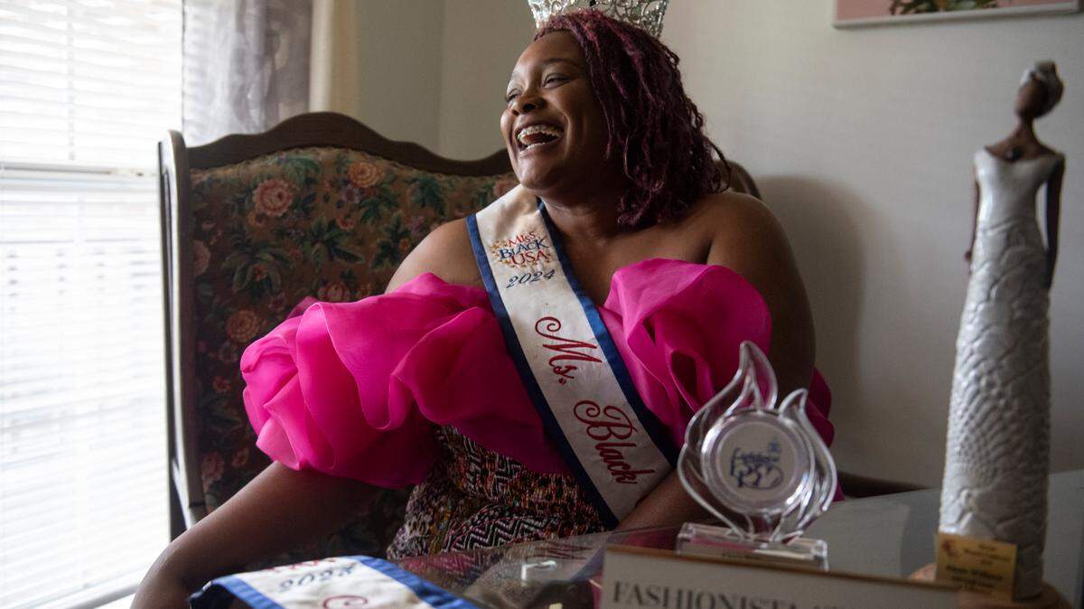 Alexis “Lexi” Williams, the reining Ms. Black Mississippi, poses for a portrait at her home in Gulfport on Wednesday, July 12, 2024. Williams, a veteran, mother and clothing designer is now vying to be Miss Black USA.