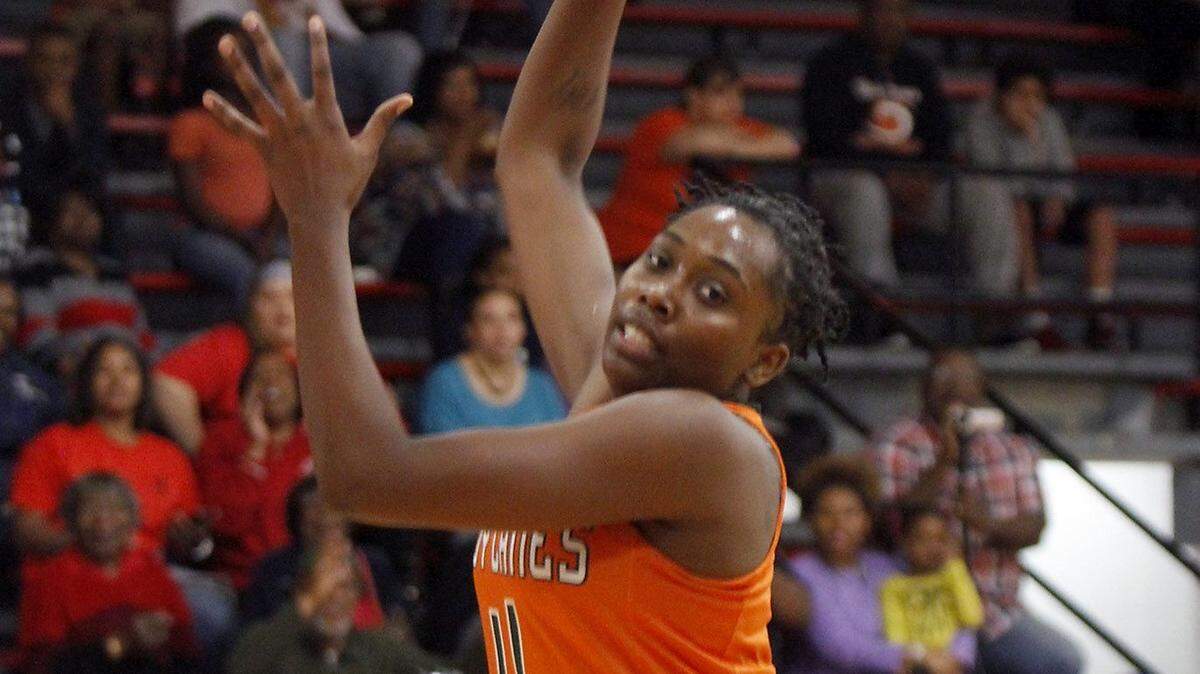 TIM ISBELL/SUN HERALD 
 West Harrison's Ameshya Williams grabs a defensive rebound against Harrison Central, Tuesday, Feb. 2, 2016.