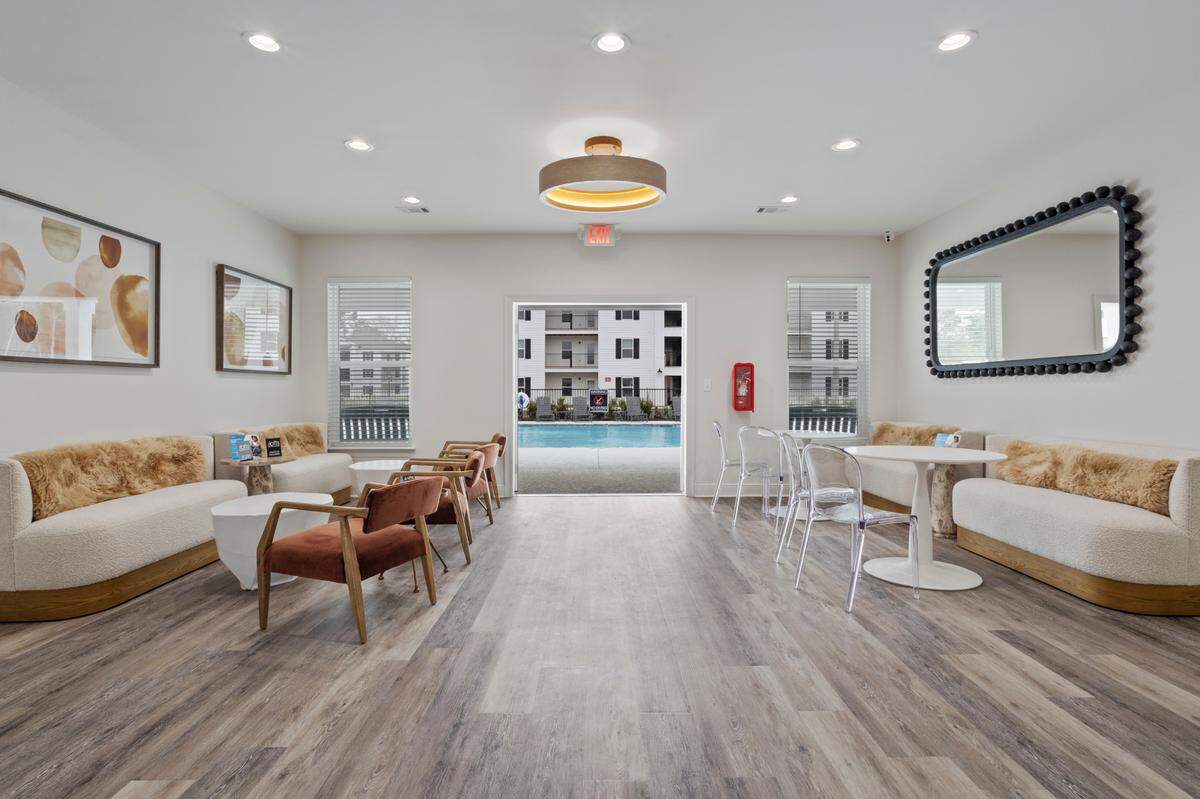 The swimming pool is seen from the clubhouse at The Lofts, a new apartment community located between Ocean Springs and D’Iberville, just off I-10.