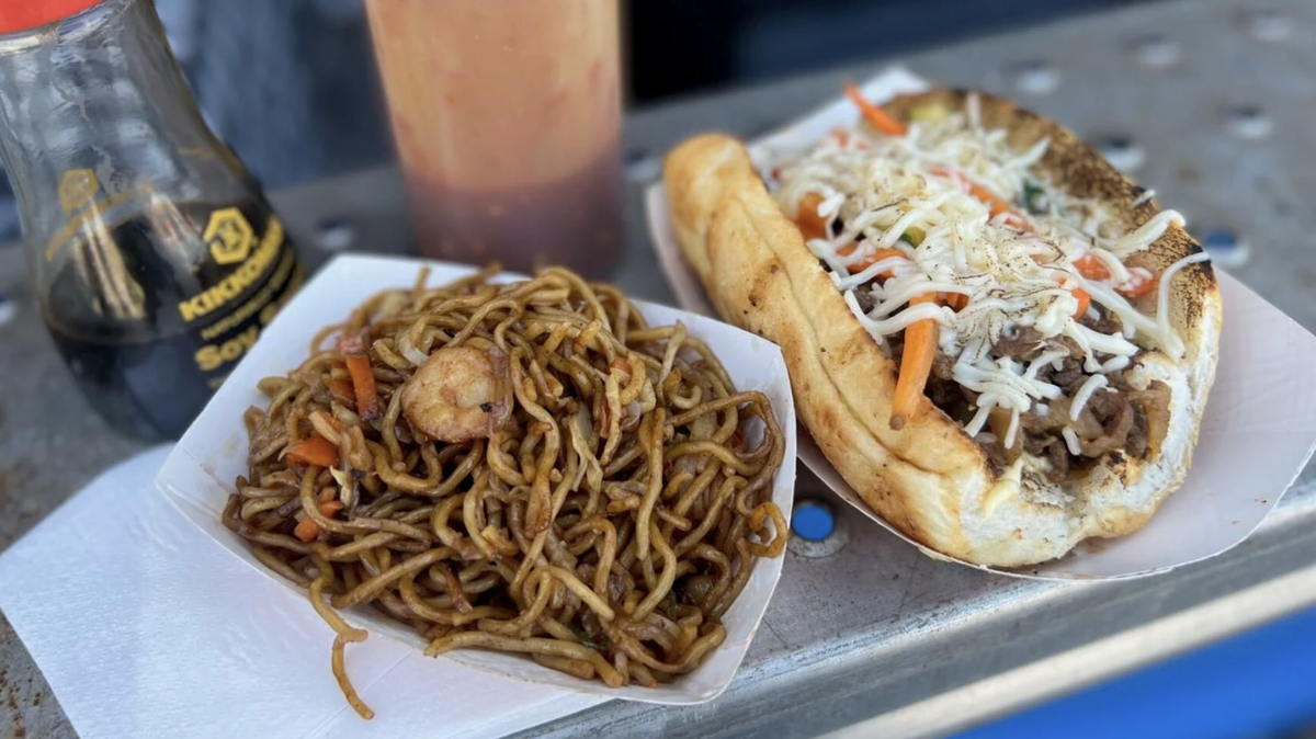 Shrimp yakisoba (left) and the yakiniku po-boy with garlic ribeye are part of the menu at food vendor Ajun Cajun at Jazz Fest. (Staff photo by Ian McNulty, NOLA.com | The Times-Picayune)