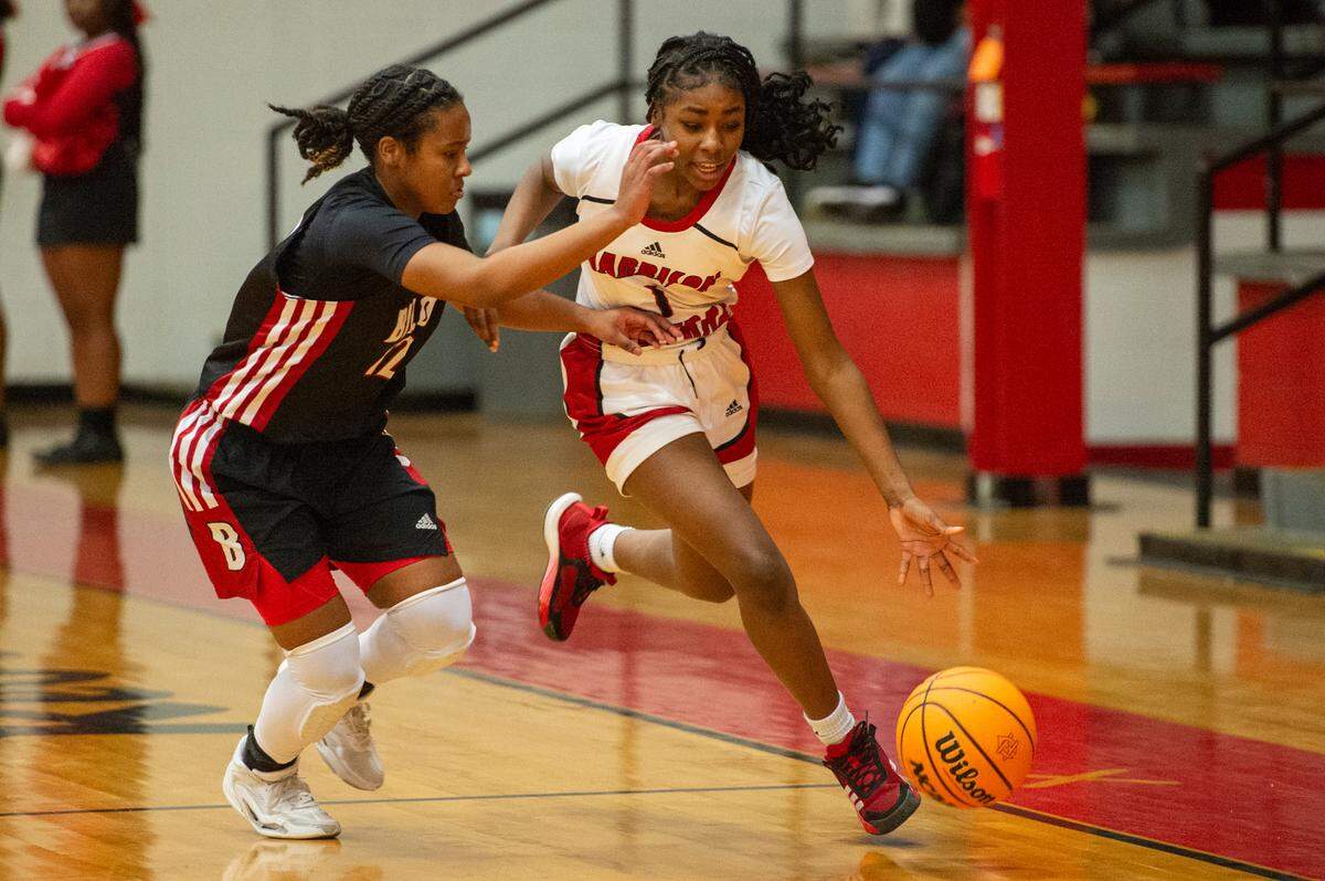Harrison Central’s Michelle Jackson dribbles the ball during a game against Biloxi at Harrison Central High School in Harrison County on Tuesday, Dec. 12, 2023.