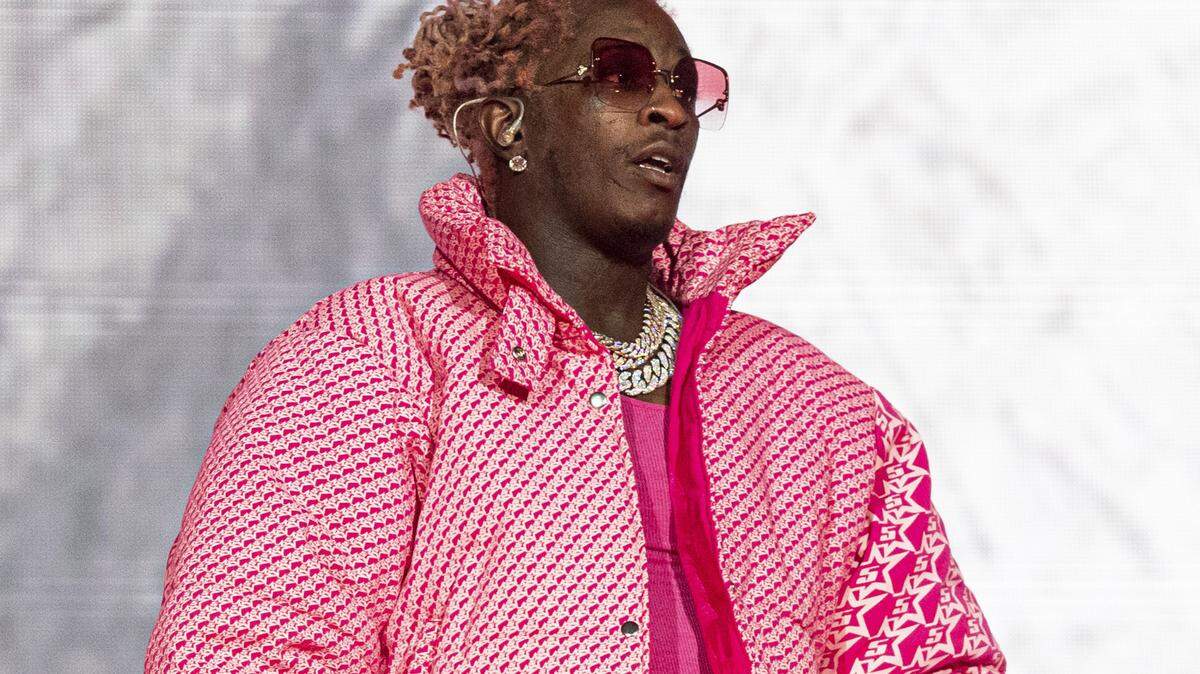 Atlanta rapper Young Thug and several others associated with Young Slime Life are charged with conspiracy to violate the RICO ACT, according to an indictment filed in Fulton County, Georgia. (Photo by Amy Harris/Invision/AP, File)