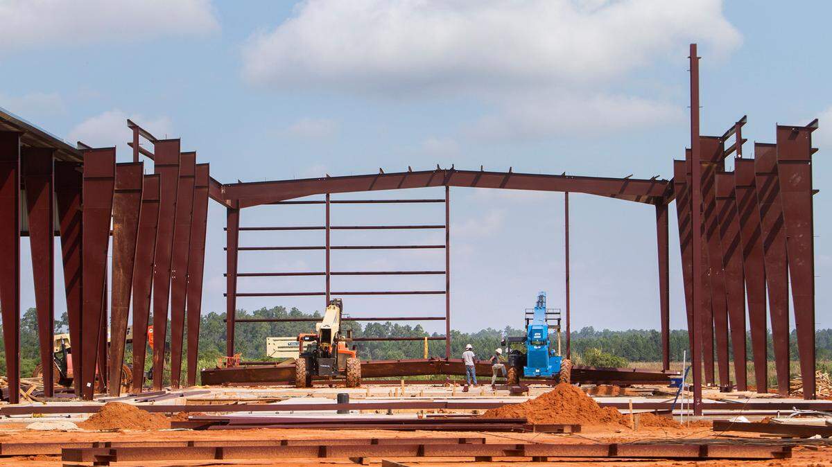 Members of a construction crew work on the expansion project for the company Jindal Tubular on Wednesday, September 17, 2014, at Port Bienville in Hancock County.