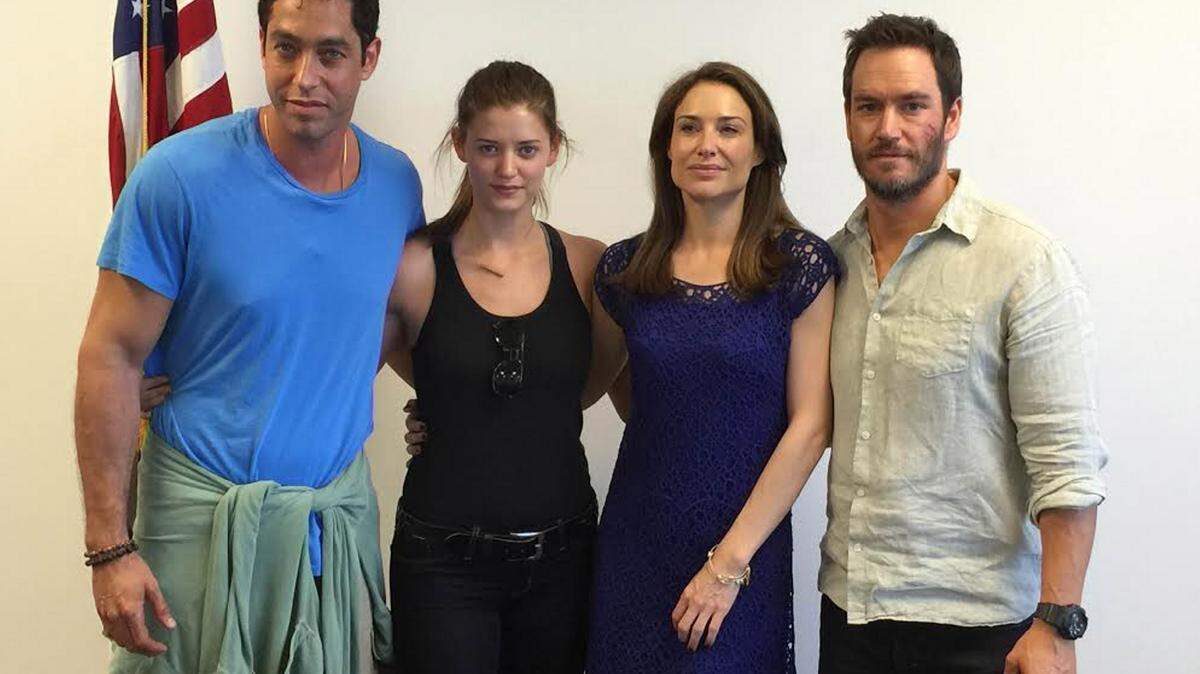 JEFF CLARK/SUN HERALD 
 The cast of "Precious Cargo:" Nick Loeb, Jenna B. Kelly, Claire Forlani and Mark-Paul Gosselaar at a press conference in Hancock County.