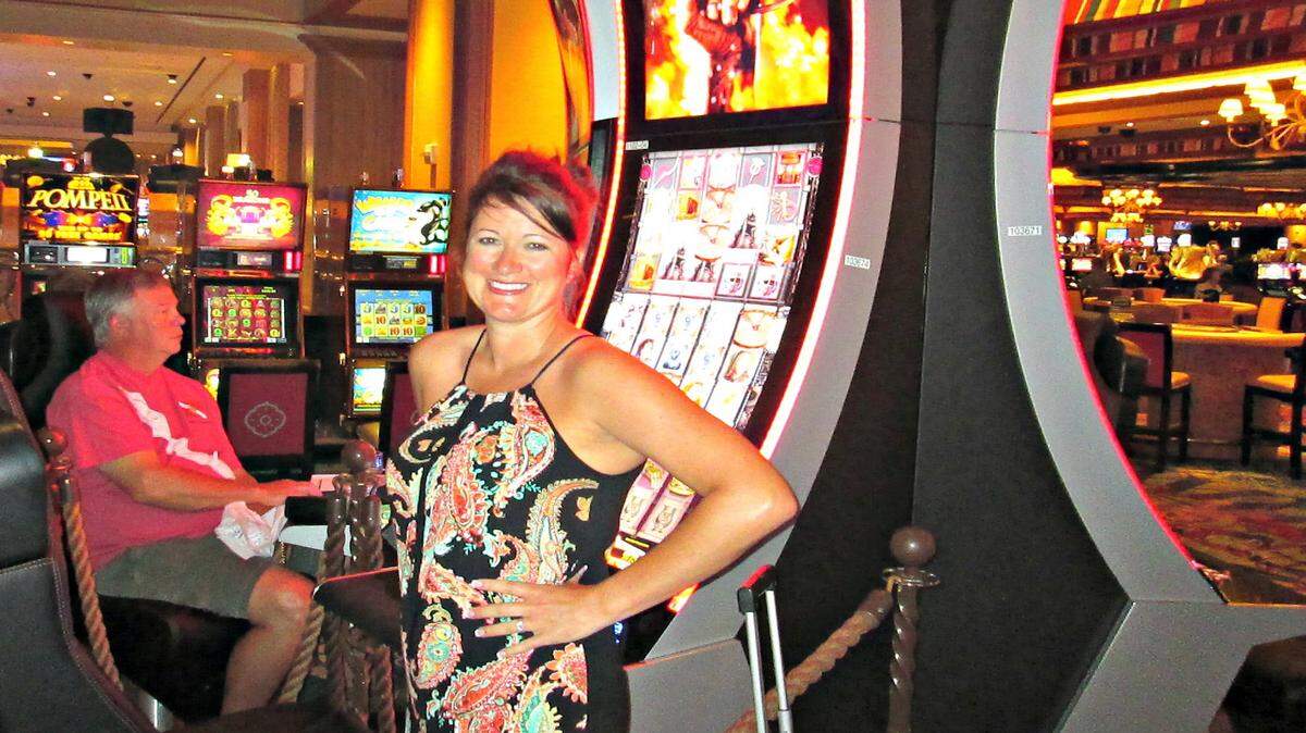 PHOTO COURTESY OF BEAU RIVAGE CASINO 
 Sarah Minix of Georgia is all smiles after winning at jackpot of $528,047.23 at the Beau Rivage Resort & Casino in Biloxi on Monday, May 23, 2016. She won on the Game of Thrones penny progressive slot machine.
