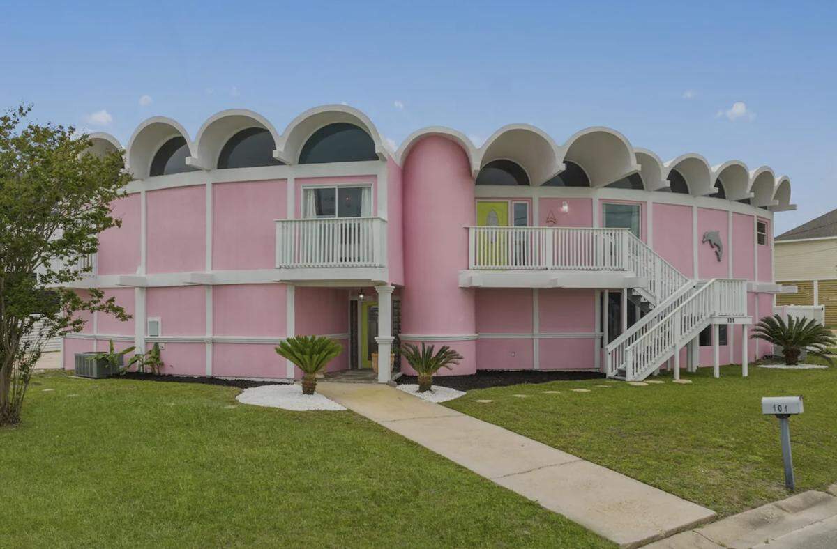 This Pass Christian house is all the buzz after being featured on Zillow Gone Wild. The bright pink color and rounded exterior in front set this $790,00 real estate listing apart.