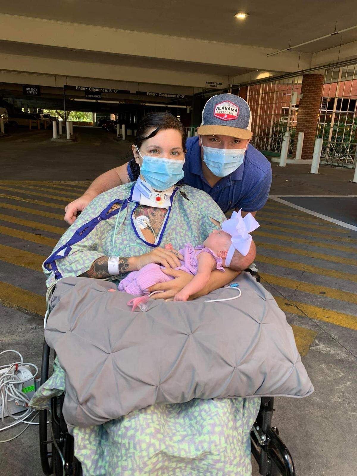 New mom and COVID patient Taylor Manning meets her daughter Maevi for the first time on Sept. 19 following her birth by emergency C-section on Aug. 3. 