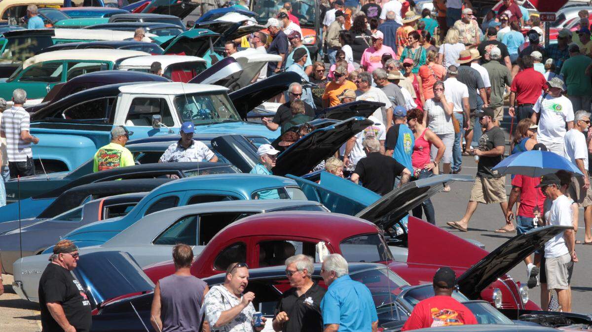 JOHN FITZHUGH/SUN HERALDVisitors look at classic cars parked on Lameuse Street during the Biloxi Cruisin' the Coast block party in 2014.
