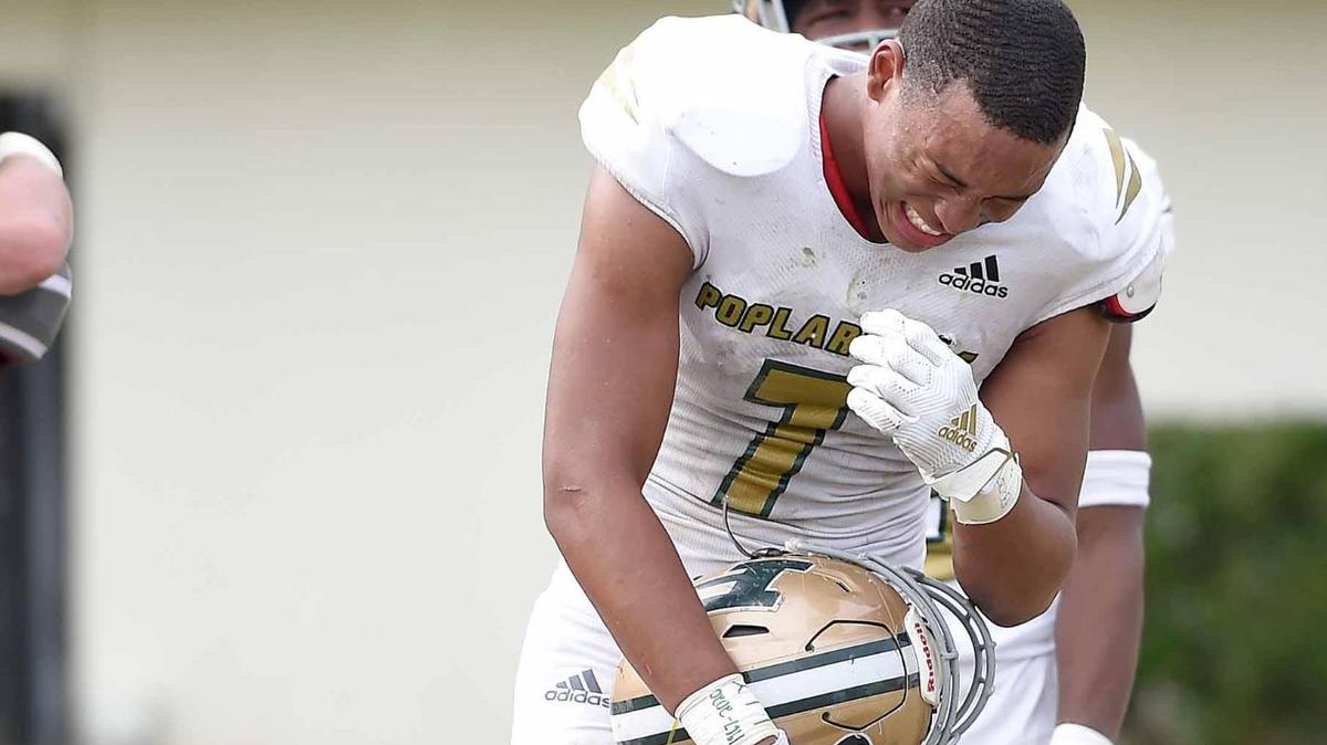 Poplarville’s Torry Polk (5) and Khalid Moore (7) emotion losing to Louisville in the 2020 MHSAA Class 4A State Football Championship at Veterans Memorial Stadium in Jackson, Mississippi.