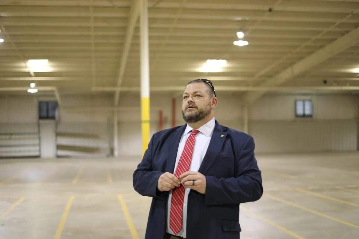 Chris Murphy, NEMCC’s vice president of finance, discusses plans for an empty furniture warehouse the college hopes to turn into a hub for its career-technical programs last month.