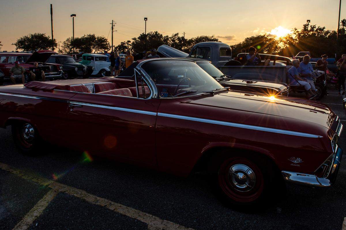 Classic cars fill the parking lot at Island View Casino in Gulfport for a flame throwing event during Cruisin’ The Coast on Tuesday, Oct. 5, 2021.