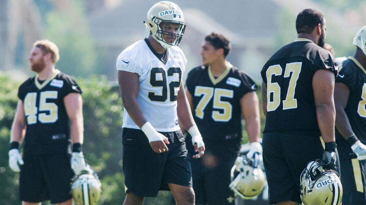 Saints defensive end Marcus Davenport participates in the first day of training camp at the Saints Training Facility in Metairie, La.,Thursday, July 26, 2018.
