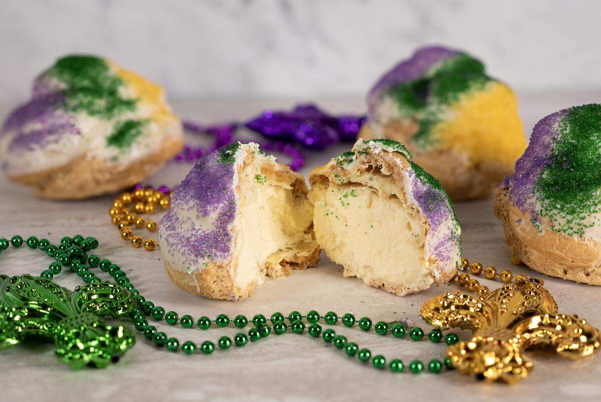 For a new twist on king cake, the bakers at Beau Rivage Resort and Casino in Biloxi created king cake cream puffs for Mardi Gras this year.