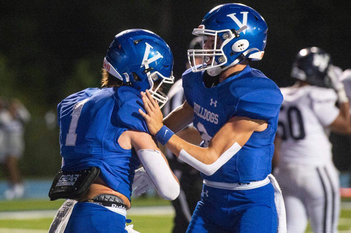 Vancleave’s John Peterson (1) and Hunter Parker (2) celebrate after a touchdown during a game against Moss Point at Vancleave Football Stadium in Vancleave on Friday, Sept. 9, 2022.