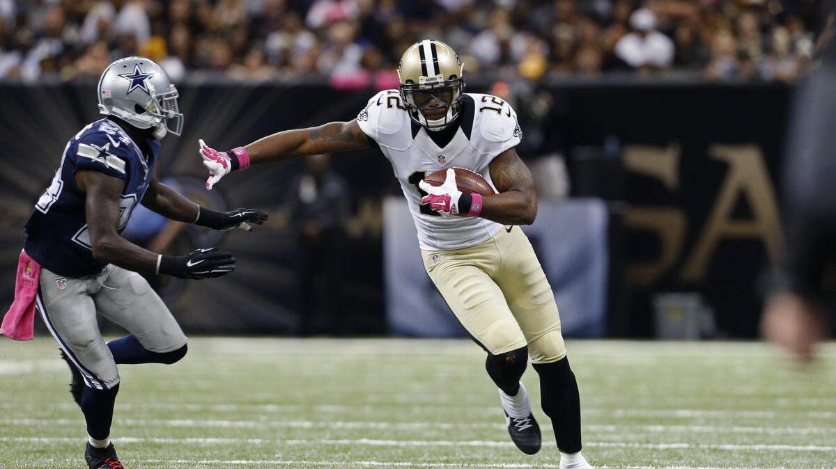New Orleans Saints wide receiver Marques Colston (12) runs against Dallas Cowboys cornerback Morris Claiborne (24) in the second half of an NFL football game in New Orleans, Sunday, Oct. 4, 2015. (AP Photo/Jonathan Bachman)