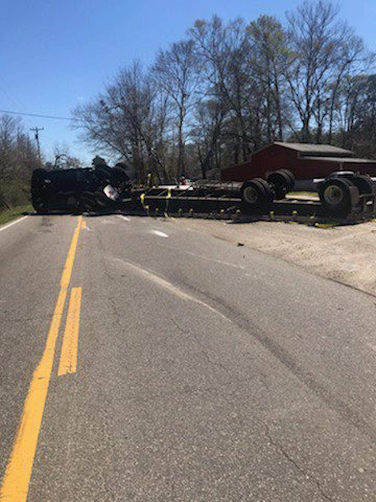 A semi-truck carrying steel overturned on Highway 11 in Pearl River County on March 17, 2022.