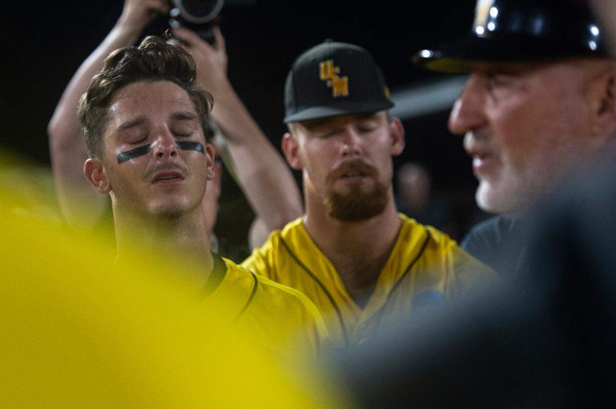 Southern Miss Head Coach Scott Berry talks to his players after Southern Miss lost to Tennessee in the NCAA Super Regional at Pete Taylor Park in Hattiesburg on Monday, June 12, 2023. Berry is retiring after the season.