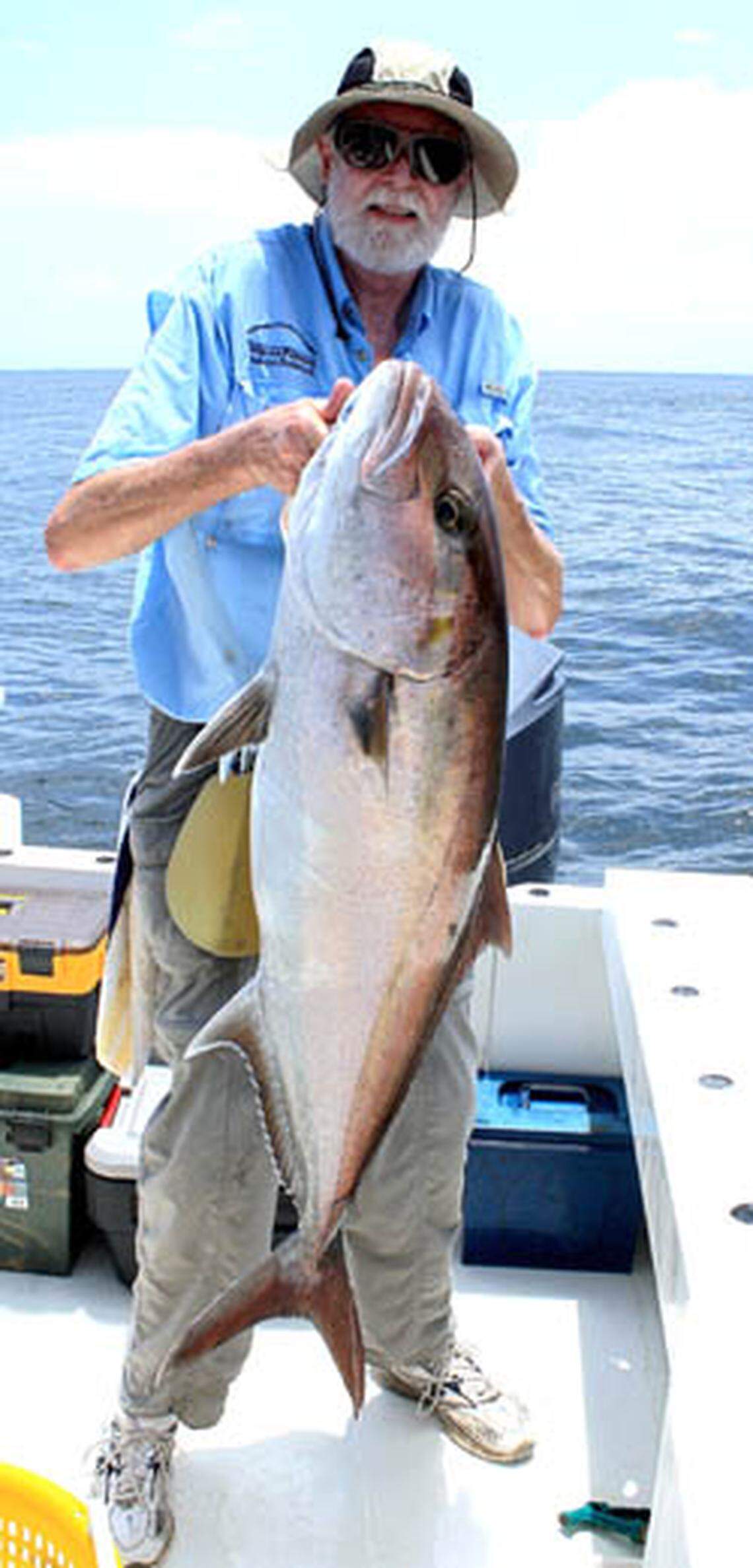 Jim Franks is pictured with an amberjack. The fisheries scientist worked closely with recreational and commercial fishermen to help with his studies of Gulf and Caribbean fish.
