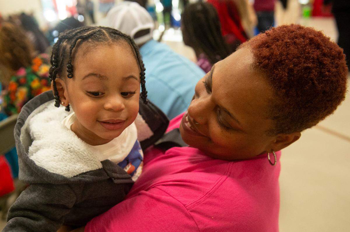 April Miles holds her grandson Jediah Parnell during a community baby shower event at Lyman Community Center in Gulfport on Thursday, Nov. 14, 2024.
